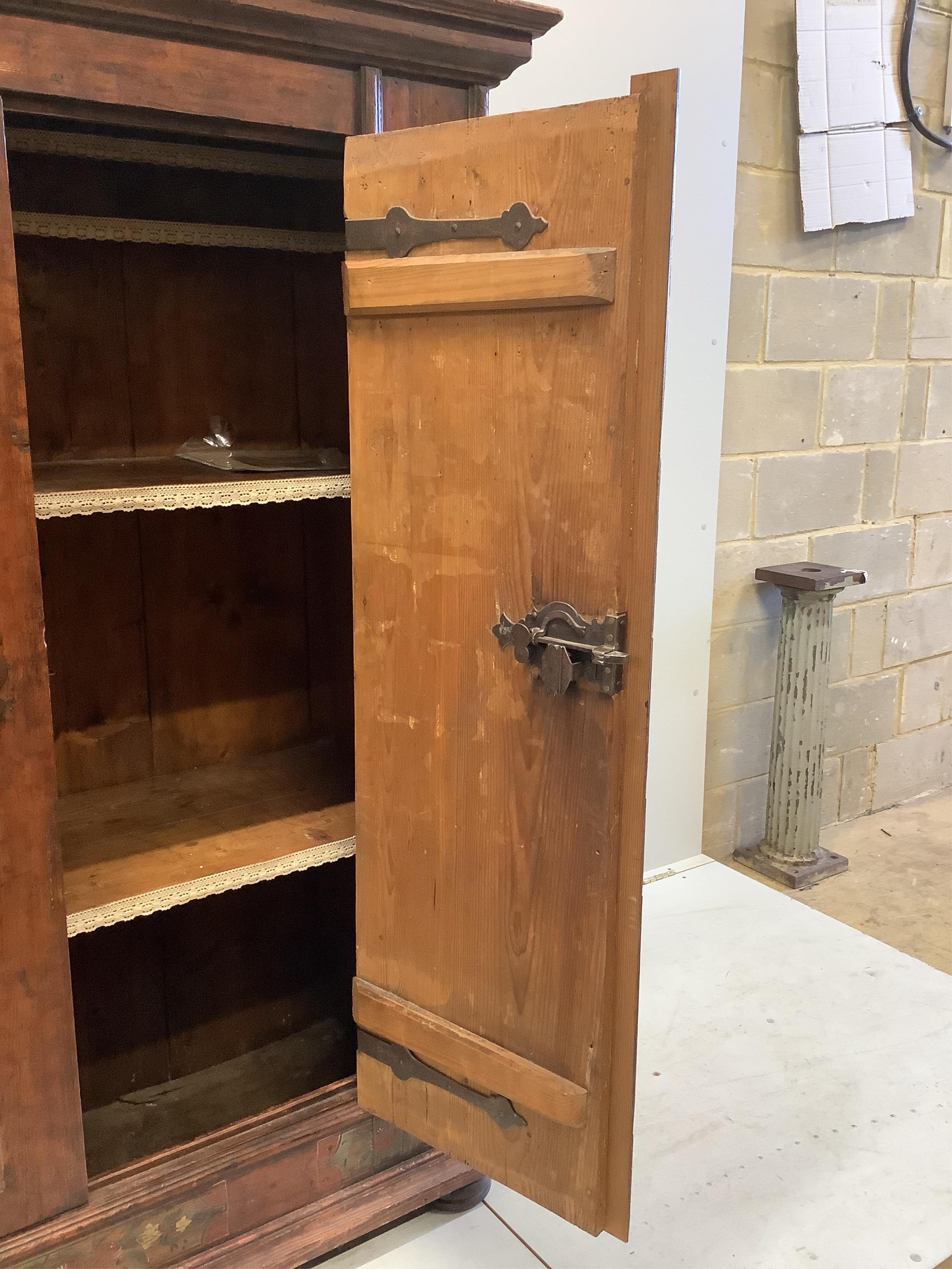 An 18th century Swiss painted pine armoire, width 131cm, depth 54cm, height 169cm. Condition - fair